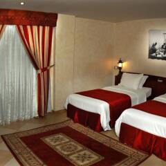Отель Al Liwan Suites комната для гостей фото 4