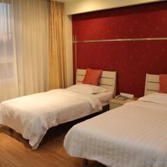 Отель Chinese Culture Holiday Hotel - Nanluoguxiang Китай, Пекин - отзывы, цены и фото номеров - забронировать отель Chinese Culture Holiday Hotel - Nanluoguxiang онлайн комната для гостей фото 4