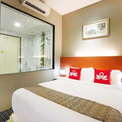 Отель Zen Rooms Changi Village Сингапур комната для гостей