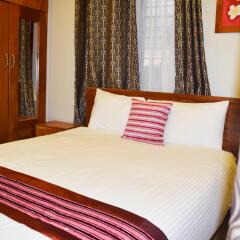 Апартаменты Al-Minhaj Serviced Apartments Вити-Леву комната для гостей фото 2