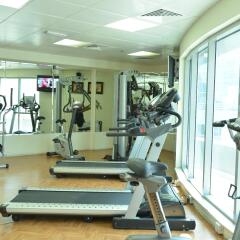 Legacy Hotel Apartments фитнесс-зал