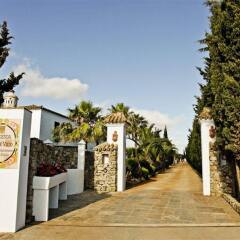 Отель Hacienda Roche Viejo