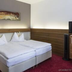Austria Trend Hotel Anatol комната для гостей фото 2