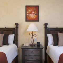 Отель Villa del Palmar Beach Resort and Spa, Puerto Vallarta сейф в номере