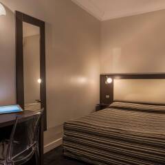 Отель Grand Hotel Leveque Франция, Париж - 4 отзыва об отеле, цены и фото номеров - забронировать отель Grand Hotel Leveque онлайн комната для гостей фото 4