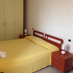 Отель Residence Yellow Римини комната для гостей