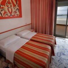 Отель Palm Beach Hotel Италия, Чинизи - 1 отзыв об отеле, цены и фото номеров - забронировать отель Palm Beach Hotel онлайн комната для гостей фото 2