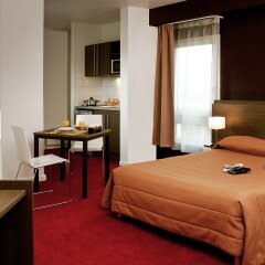 Отель Aparthotel Adagio access Paris La Villette Франция, Париж - отзывы, цены и фото номеров - забронировать отель Aparthotel Adagio access Paris La Villette онлайн комната для гостей фото 4