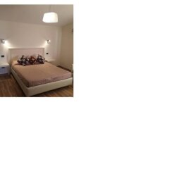 Отель Villa Amico B&B Агридженто сейф в номере