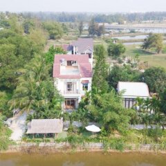 Отель Tra Que Riverside Homestay фото 3