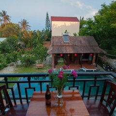 Отель Tra Que Flower Homestay Вьетнам, Хойан - отзывы, цены и фото номеров - забронировать отель Tra Que Flower Homestay онлайн балкон
