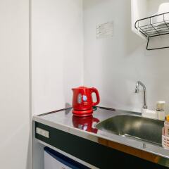 Guesthouse Chiharu - Hostel Фукуока в номере