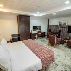 Отель Alphaplus Apartments Нигерия, Абуджа - отзывы, цены и фото номеров - забронировать отель Alphaplus Apartments онлайн комната для гостей фото 4