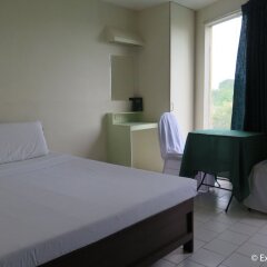 Отель Ponce Suites Gallery Hotel Филиппины, Давао - отзывы, цены и фото номеров - забронировать отель Ponce Suites Gallery Hotel онлайн комната для гостей фото 4