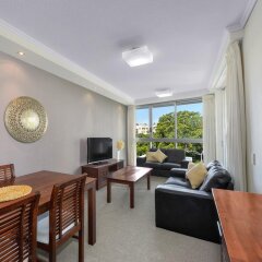 Апартаменты The Hub Apartments комната для гостей
