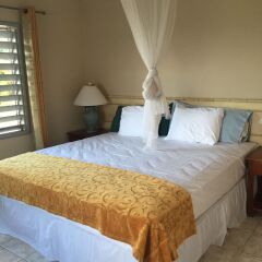 Отель Captain's Cove Beach Resort & Villas комната для гостей фото 4