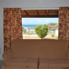 The Red Cottage in San Nicolas, Aruba from 433$, photos, reviews - zenhotels.com guestroom photo 2