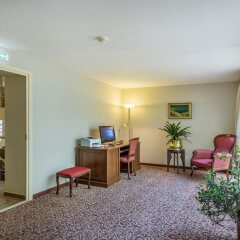 Отель Ratonda Centrum Hotel Литва, Вильнюс - 6 отзывов об отеле, цены и фото номеров - забронировать отель Ratonda Centrum Hotel онлайн интерьер отеля фото 2