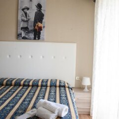 Hotel Vergilius Риччоне комната для гостей фото 4