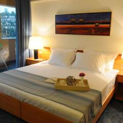 Ithea Suites Hotel комната для гостей