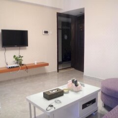 Апартаменты Shenzhen Xin Phoenix Gang Ao 8 Apartment удобства в номере