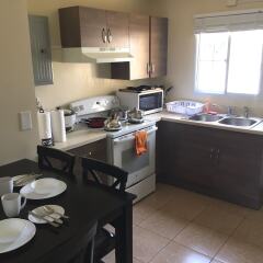 Отель Alupang Residence в номере