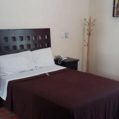 Posada Hotel Punto Guadalajara комната для гостей