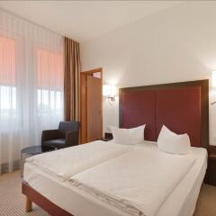 Отель AZIMUT Hotel Munich Германия, Мюнхен - 10 отзывов об отеле, цены и фото номеров - забронировать отель AZIMUT Hotel Munich онлайн комната для гостей фото 4