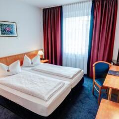 Hotel Antares Мюнхен сейф в номере