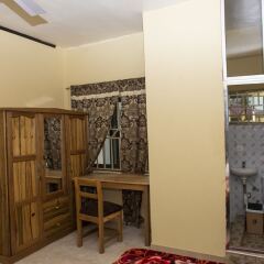 Отель Infinity Guest House удобства в номере