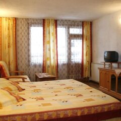 Отель Hadjipopov Green Lodge Банско комната для гостей фото 5