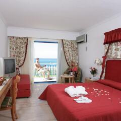 Отель Mitsis Rinela Beach Resort & Spa - All Inclusive комната для гостей