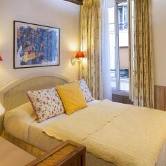 Отель Hôtel Du Cygne Париж комната для гостей фото 4