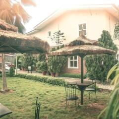 Отель Cotton Suites