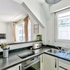 Отель 37 - Luxury Flat Montaigne Париж в номере