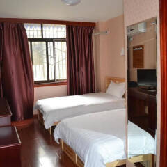 Отель Zhengfu Caotang Decent Inn сейф в номере
