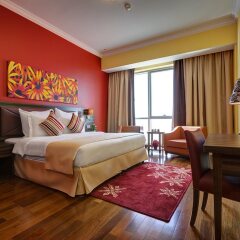 Abidos Hotel Apartment, Dubailand комната для гостей фото 3