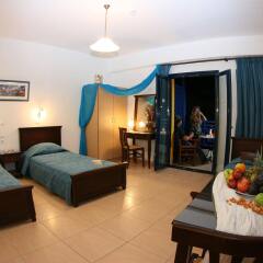 Aegean Sky Hotel & Suites комната для гостей фото 3