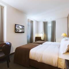 Lisboa Carmo Hotel комната для гостей фото 4