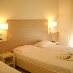 Hotel Ghirlandina Римини комната для гостей