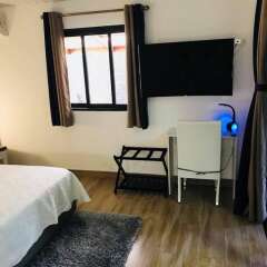 Отель House With 2 Bedrooms in Puna'auia, With Enclosed Garden and Wifi Французская Полинезия, Пунаауиа - отзывы, цены и фото номеров - забронировать отель House With 2 Bedrooms in Puna'auia, With Enclosed Garden and Wifi онлайн сейф в номере