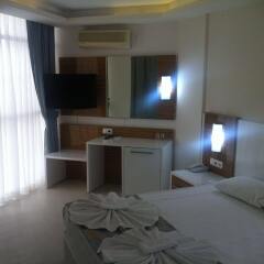 Отель Poseidon Cesme Resort � All Inclusive Чешме комната для гостей