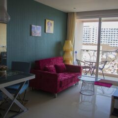 Апартаменты Grande Caribbean Pattaya Apartment Паттайя комната для гостей фото 4
