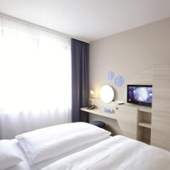 H2 Hotel Berlin Alexanderplatz комната для гостей