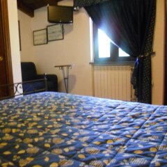 Отель Agriturismo La Casa Del Ghiro Пимонт удобства в номере
