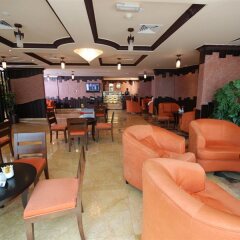 Отель Al Bustan Hotel ОАЭ, Шарджа - 1 отзыв об отеле, цены и фото номеров - забронировать отель Al Bustan Hotel онлайн гостиничный бар