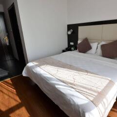 Отель Joyfulstar Hotel Pudong Airport Chenyang Китай, Шанхай - отзывы, цены и фото номеров - забронировать отель Joyfulstar Hotel Pudong Airport Chenyang онлайн комната для гостей