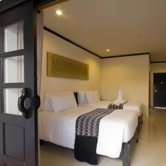 Отель Golden Tulip Essential Pattaya комната для гостей фото 4