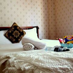 Отель Encore Walking St. Guesthouse в номере