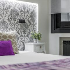 Отель Apartamento Luxury Palacio Real комната для гостей фото 5